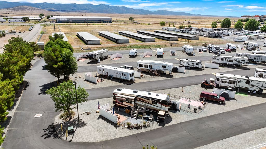 An aerial view showing Fairgrounds RV Park alongside the Yavapai County Fairgrounds buildings.